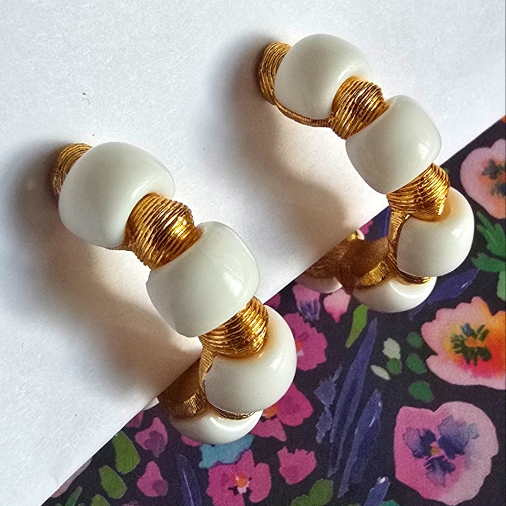 Vintage Trifari earrings Crown hoop white plastic gold tone metal clip on